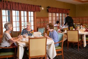 residents having lunch in main dining cafe