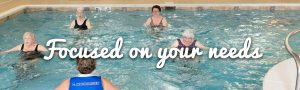 focused on your needs with residents in pool exercising