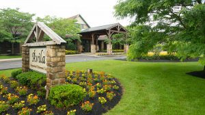 Avila Grand Lodge entrance with flowers in bloom